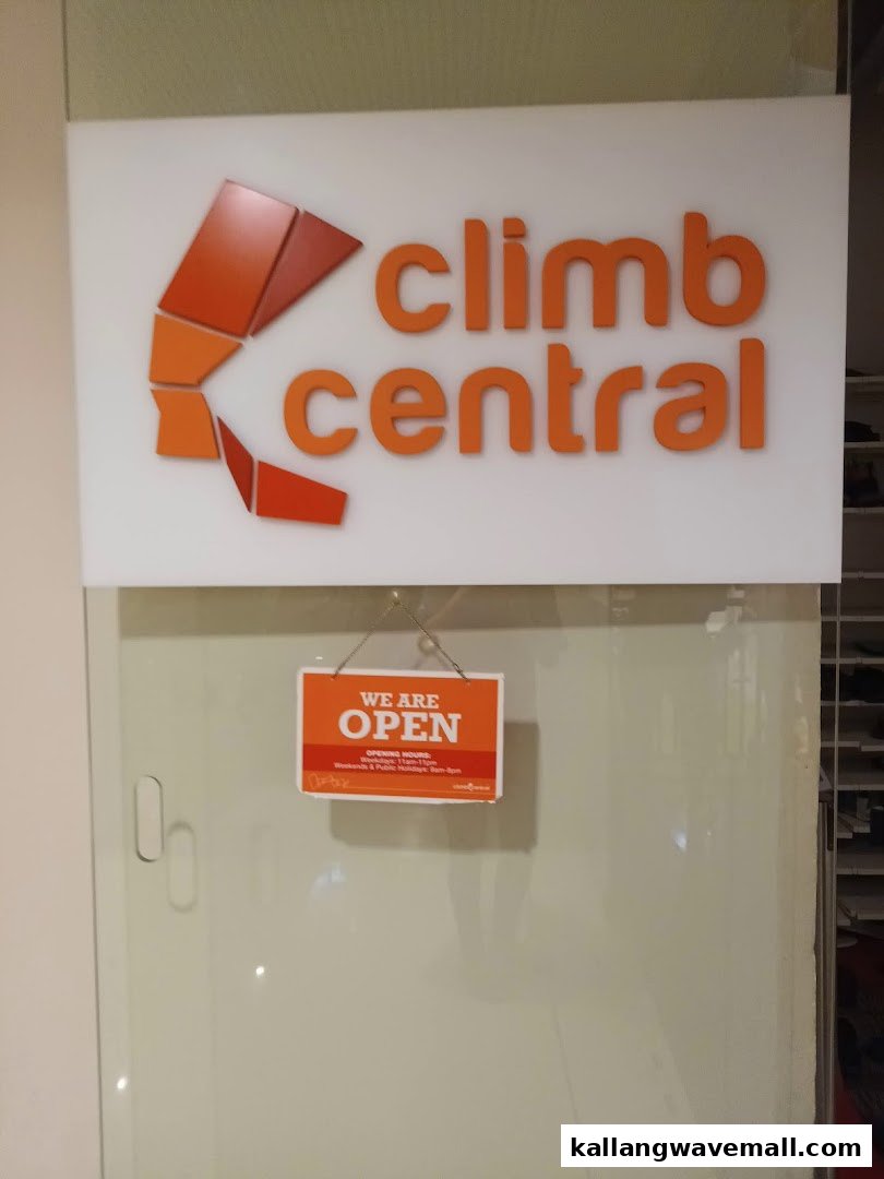 The shop front of Climb Central Sports Hub, featuring its orange logo and an 'OPEN' sign.