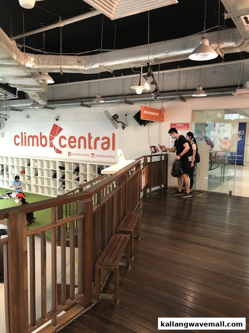 Interior view of Climb Central Sports Hub, showing the reception area, logo, and part of the climbing facility.