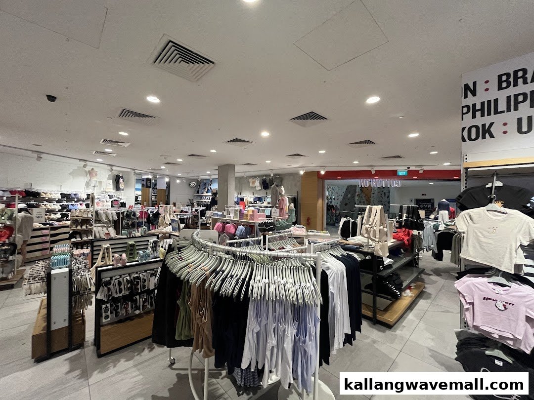 Interior view of Cotton On Sports Hub, showcasing a wide array of casual wear, activewear, and accessories on display.