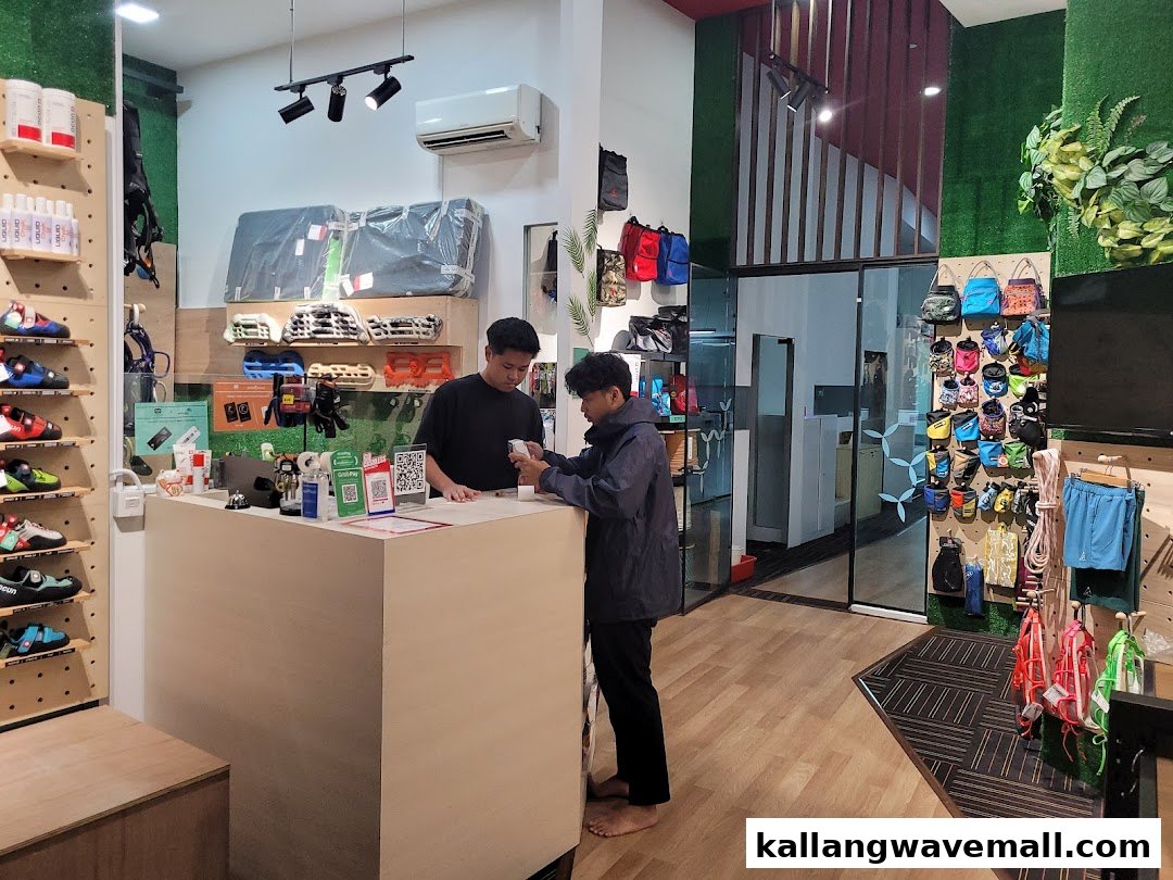Customers at the counter of Crank Factory by Climb Asia, a shop selling climbing gear and apparel.