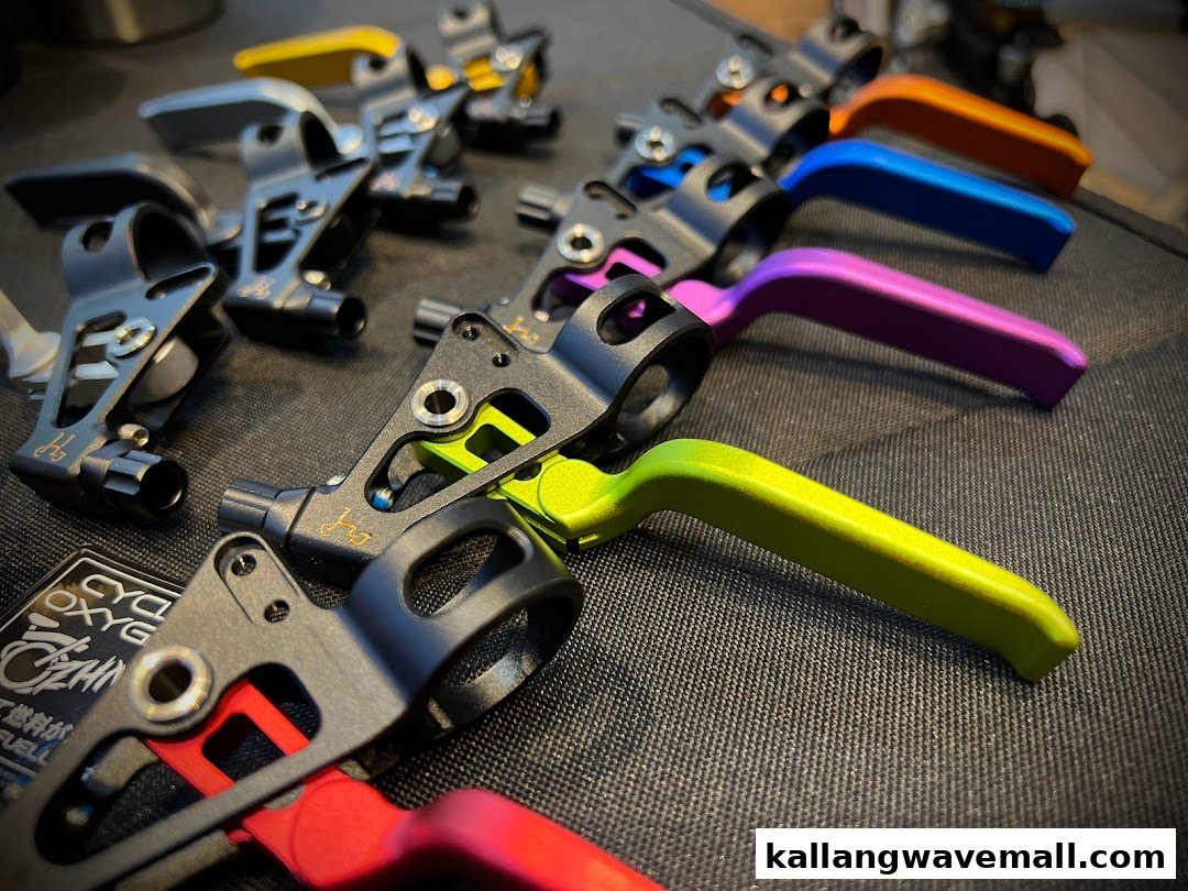 Close-up of colorful, high-performance bicycle brake levers or shifters from CycleOxygen.