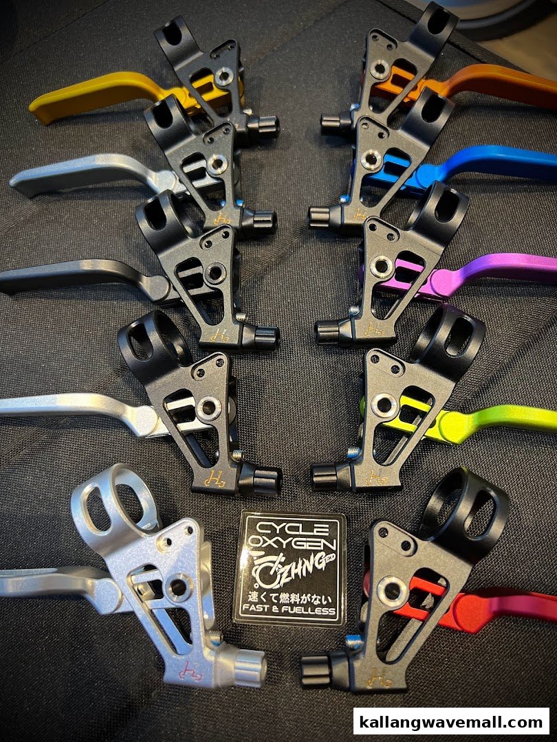 A symmetrical display of colorful bicycle brake levers from CycleOxygen, showcasing their product range.
