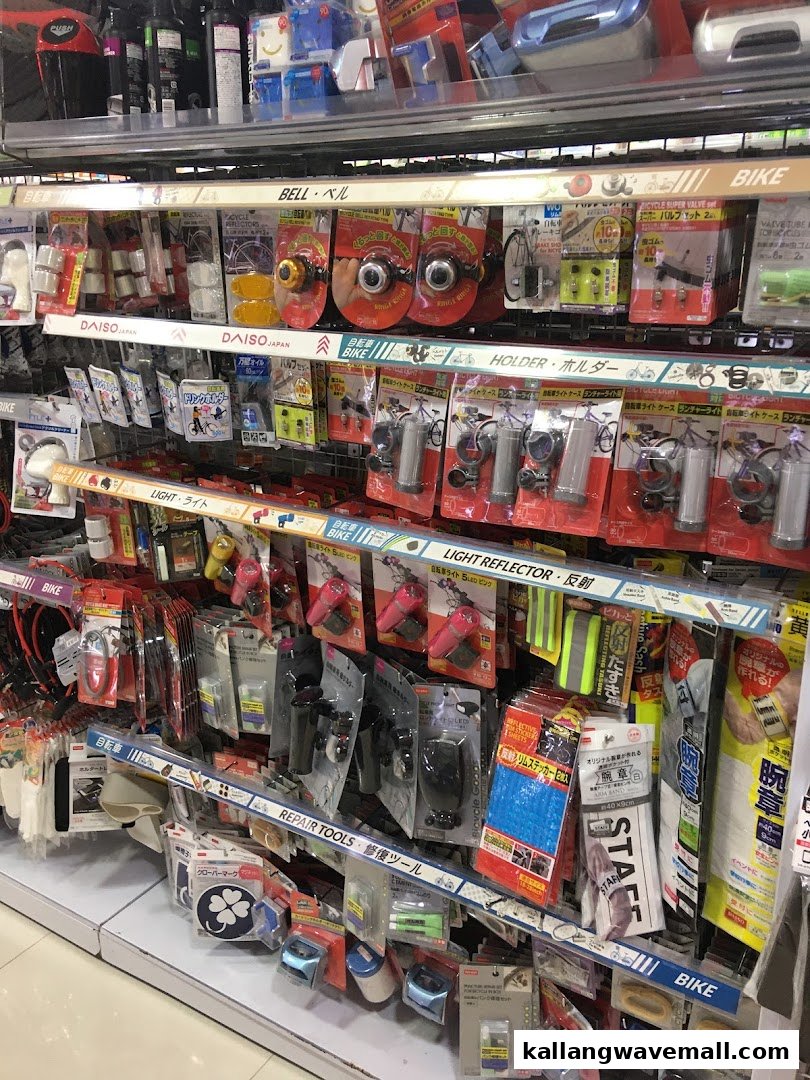 Shelves at Daiso displaying a wide range of bicycle accessories and repair tools.
