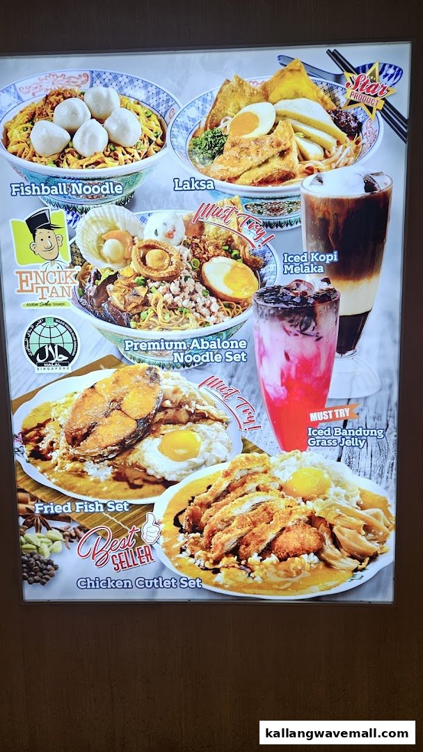A vibrant display board showcasing Encik Tan's popular noodle dishes, fried sets, and refreshing beverages.
