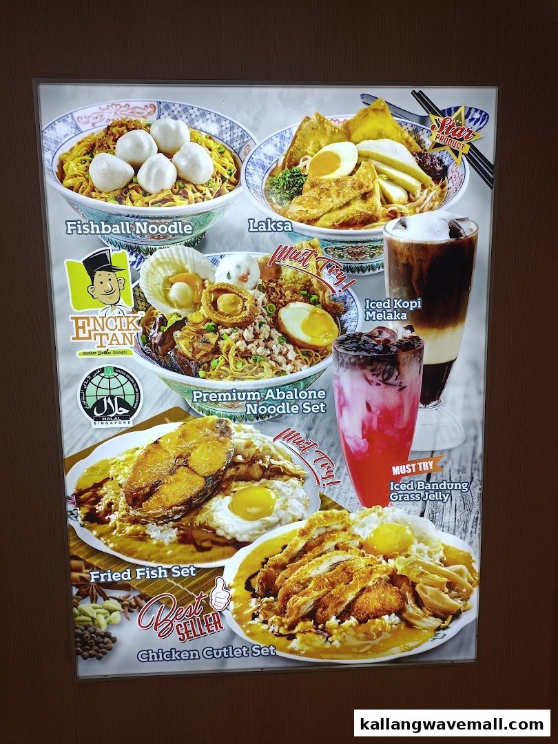 A brightly lit menu board showcasing Encik Tan's signature Singaporean dishes and beverages.