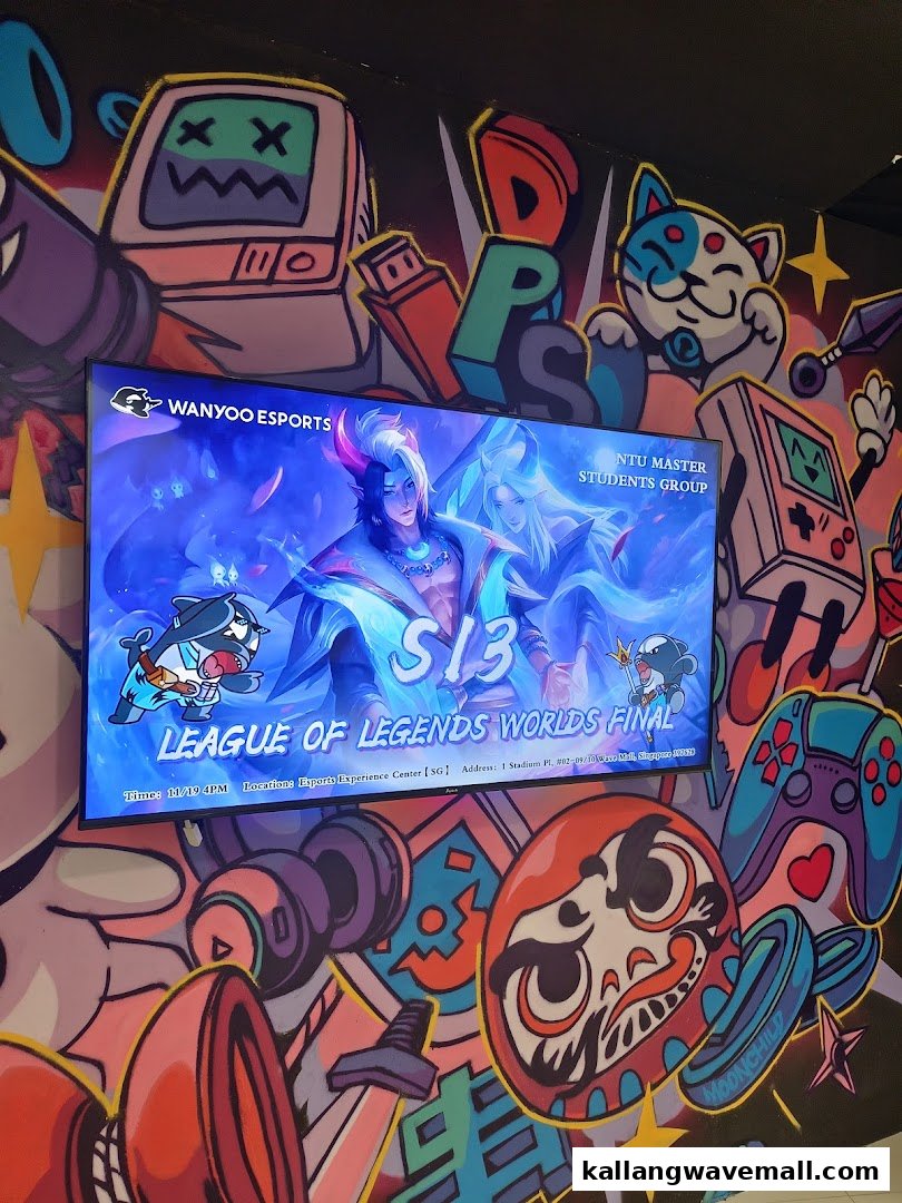 A vibrant esports-themed wall mural with a screen displaying a League of Legends Worlds Final event.