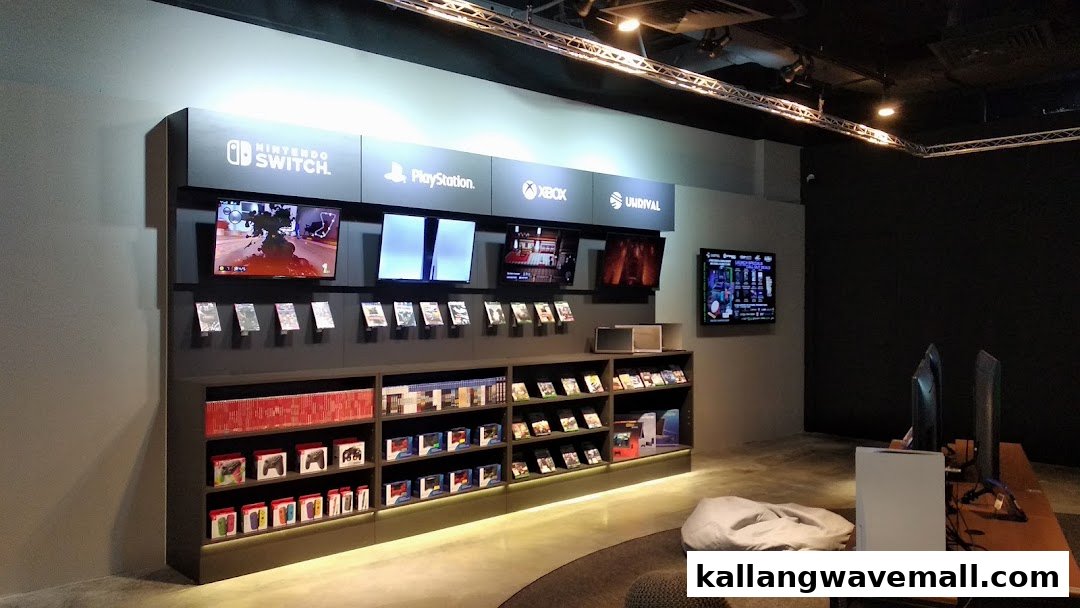 An interior view of an Esports Experience Center featuring gaming consoles, games, and play stations.