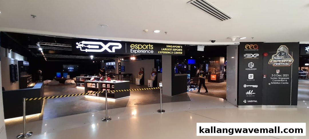 View of the Esports Experience Center entrance, showcasing gaming setups and promotional displays.