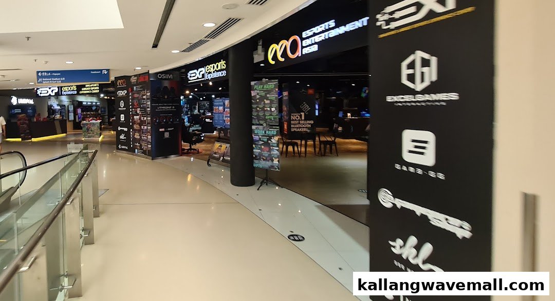 The Esports Experience Center shop front and interior, featuring gaming setups and tech displays within a mall.