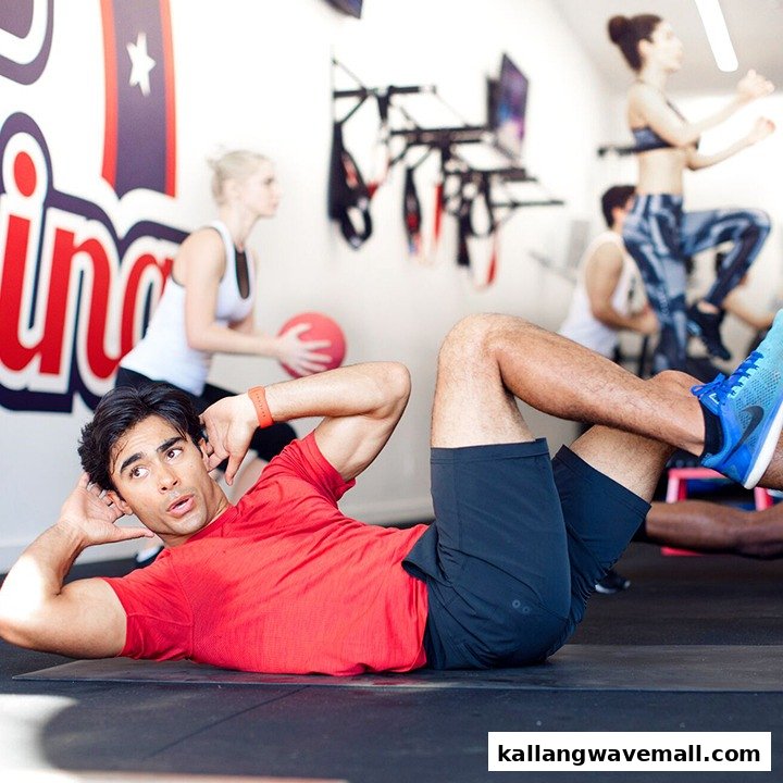 People engaged in a high-energy functional training workout session at F45 Training.