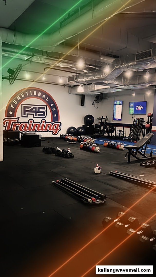 Interior view of F45 Training gym with various fitness equipment and branding.