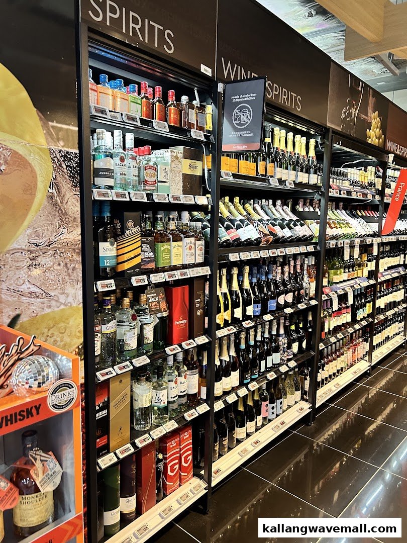 Shelves filled with a wide variety of spirits, wines, and champagnes at FairPrice Xtra.