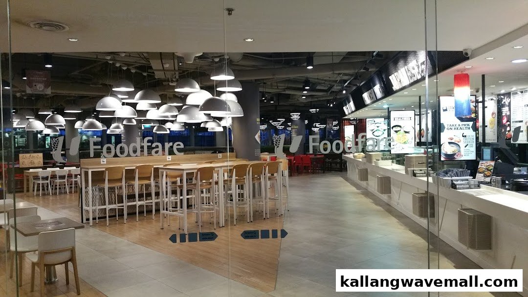A spacious and modern Foodfare food court interior with various food stalls and ample seating.