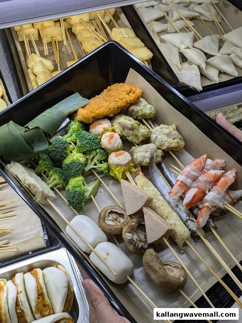 A vibrant selection of fresh ingredients on skewers, ready for hotpot or grilling.