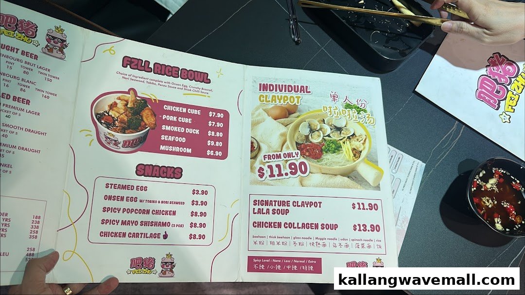 An open menu from Fei Zhu Lok Lok Claypot Lala Hotpot Restaurant, showcasing various food and drink options.