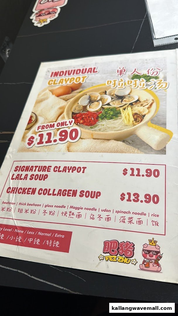 A close-up view of the menu for Fei Zhu Lok Lok, featuring claypot and hotpot dishes.