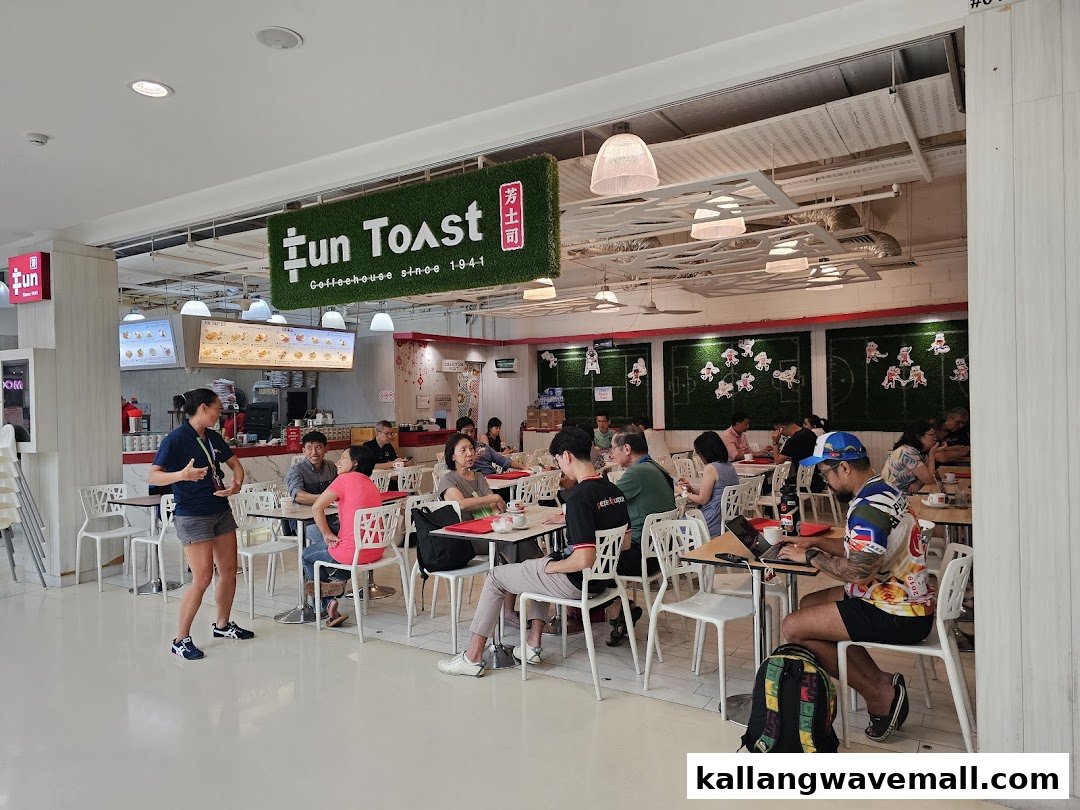 A bustling interior view of Fun Toast, showing customers enjoying meals in a bright, casual setting.