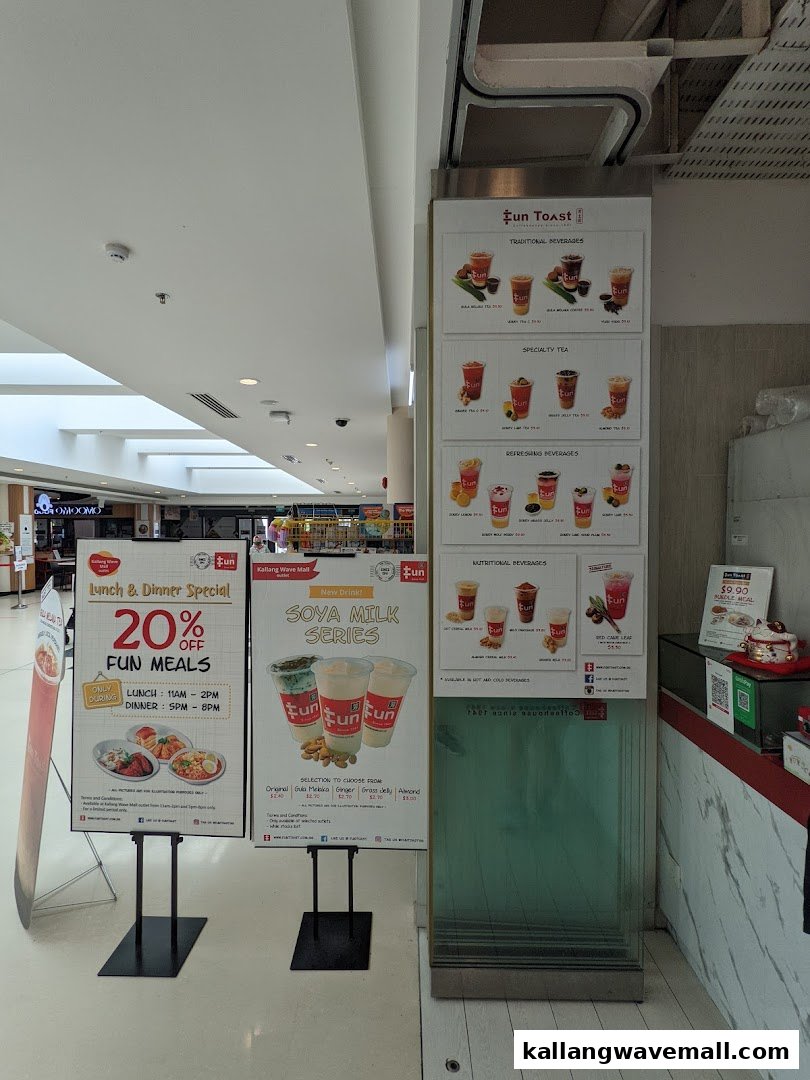 Promotional displays and a large menu board for Fun Toast beverages and meals.