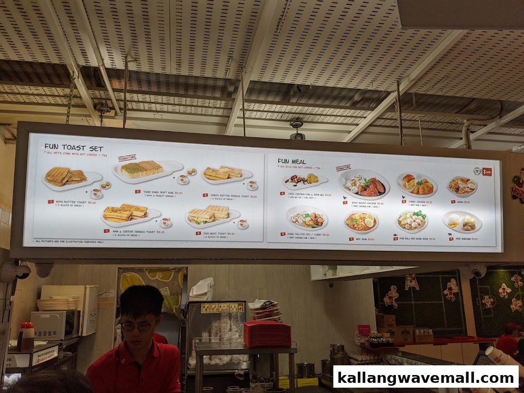 A brightly lit menu board at Fun Toast, showcasing various toast sets and local meal options with prices.