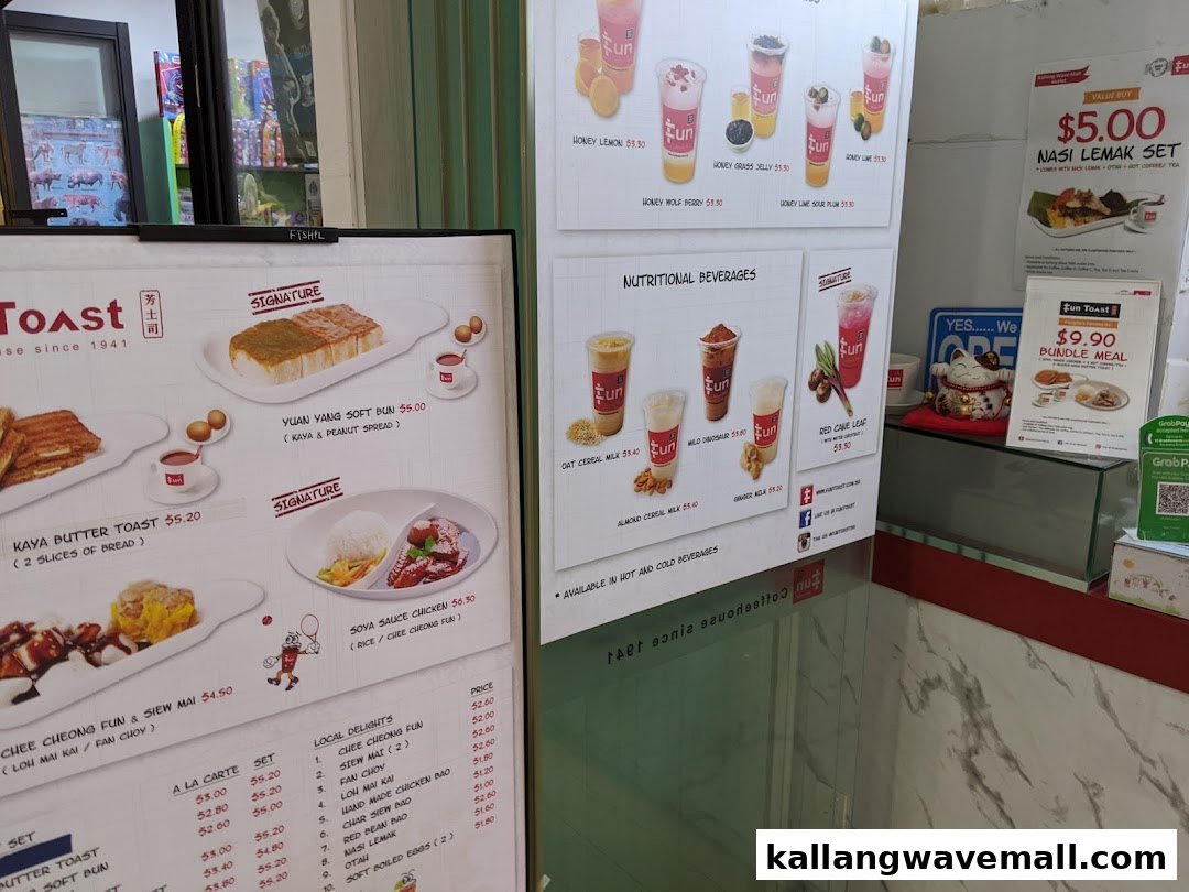 Menu boards for Fun Toast, showcasing traditional Singaporean breakfast items, local delights, and various beverages.