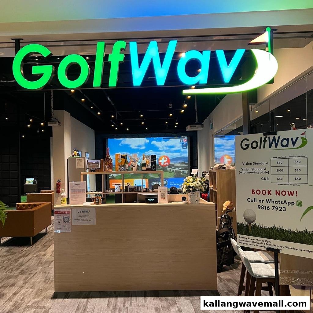 Entrance of GolfWav, an indoor golf simulation center, with reception desk and pricing visible.