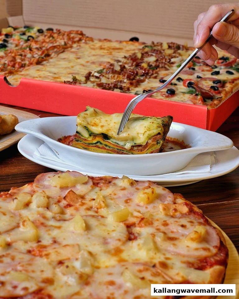 A close-up of various pizzas and a lasagna dish being served, showcasing a delicious meal.