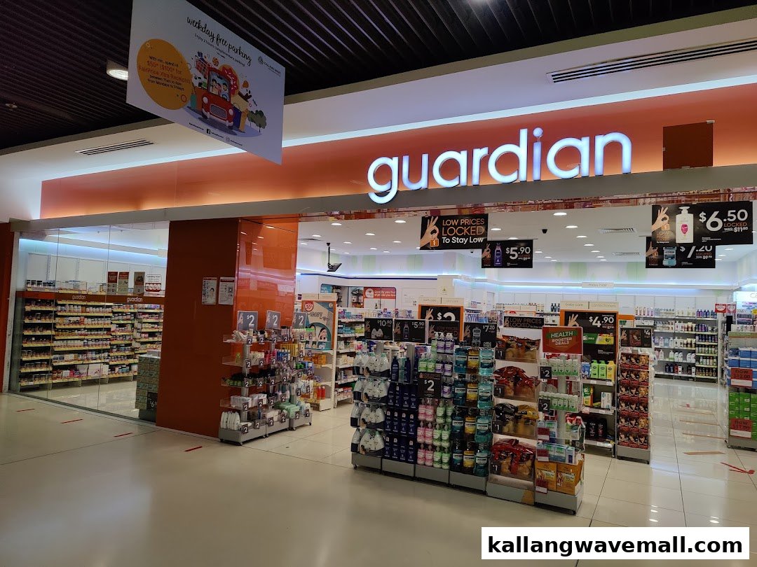 The brightly lit entrance of Guardian Health & Beauty Pharmacy, showcasing various health and beauty products.