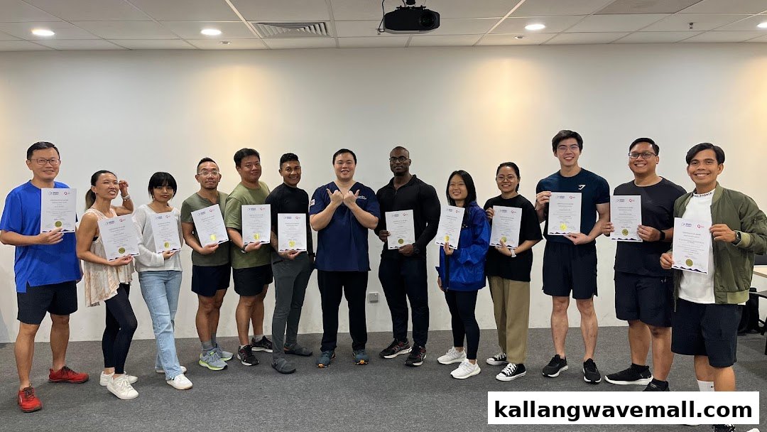 A group of diverse individuals proudly holding certificates after completing a course at ISA.