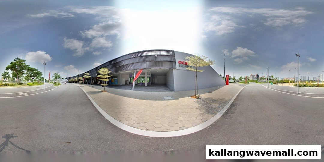 Panoramic view of the International Sports Academy entrance at OCE Square under a cloudy sky.