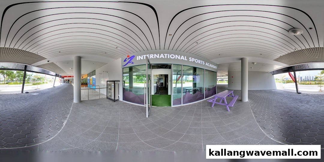 The exterior of International Sports Academy ISA with its entrance and outdoor seating.