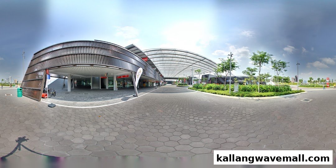 A panoramic view of the modern International Sports Academy (ISA) building exterior and surrounding open area.
