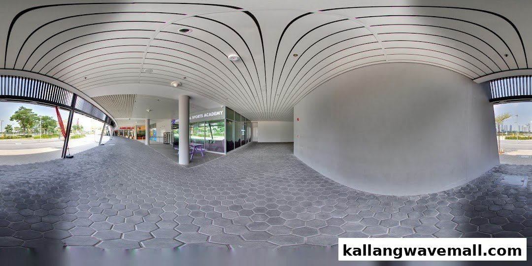 Exterior view of International Sports Academy ISA with a modern covered walkway and outdoor seating.