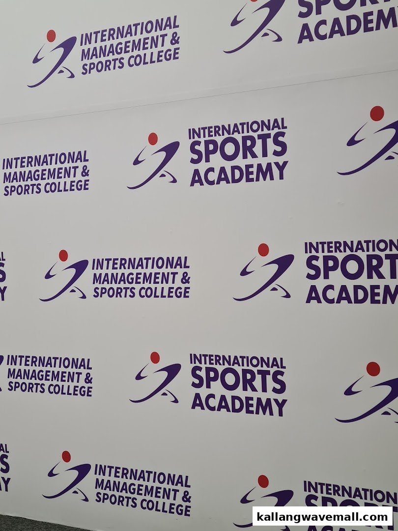 A white backdrop featuring repeated logos and names for International Sports Academy and Management & Sports College.