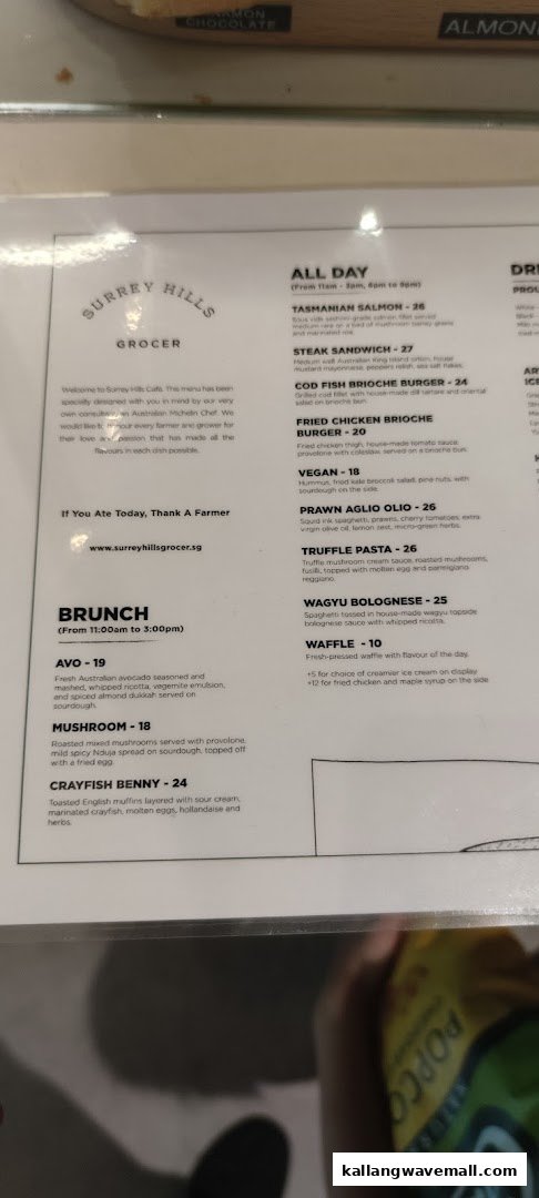A detailed menu from Surrey Hills Grocer, featuring all-day and brunch selections with prices.