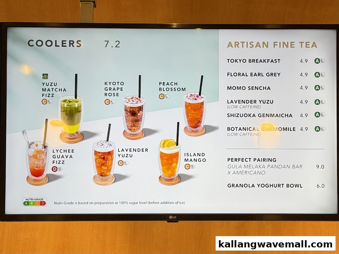 A digital menu board displaying a variety of cool drinks, artisan teas, and light food pairings.