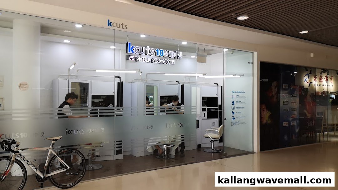 Exterior view of kcuts hair salon, showcasing its modern facade and customers inside.