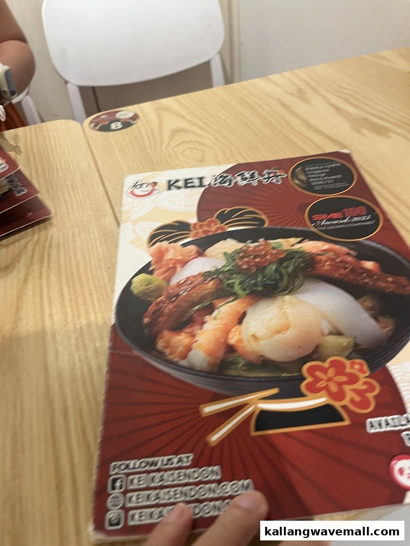 A Kei Kaisendon menu cover featuring a vibrant seafood donburi bowl.