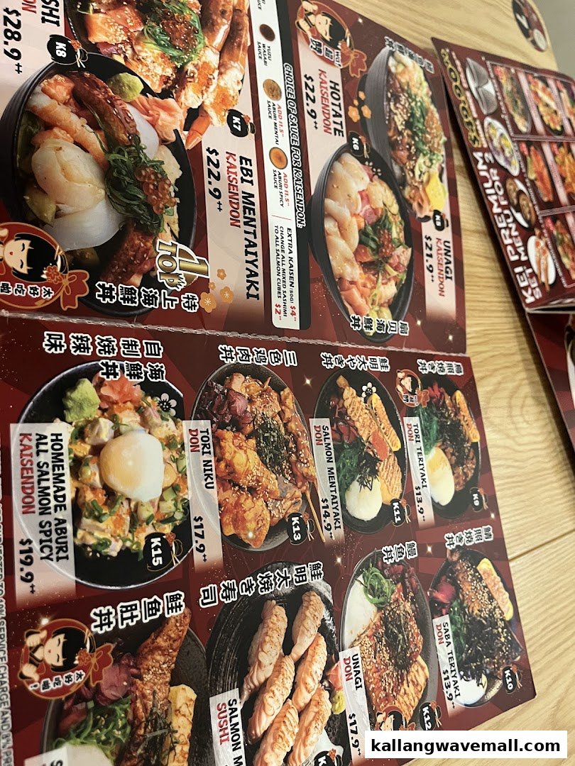 A close-up view of a Japanese restaurant menu featuring various donburi and sushi dishes.