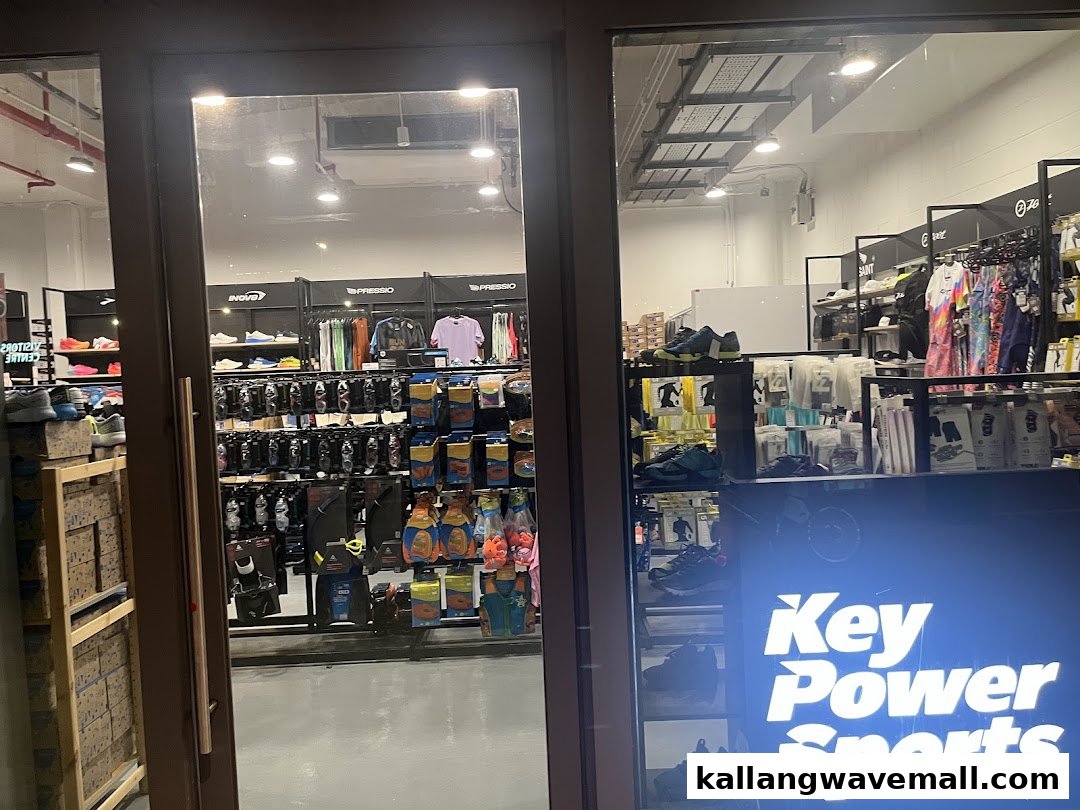 View of Key Power Sports shop entrance, showcasing sports apparel, footwear, and accessories.