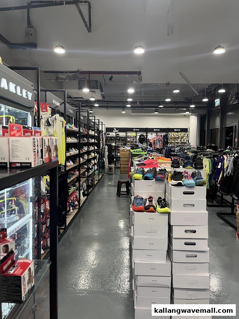 Interior view of Key Power Sports, showcasing athletic footwear, apparel, and accessories on display.