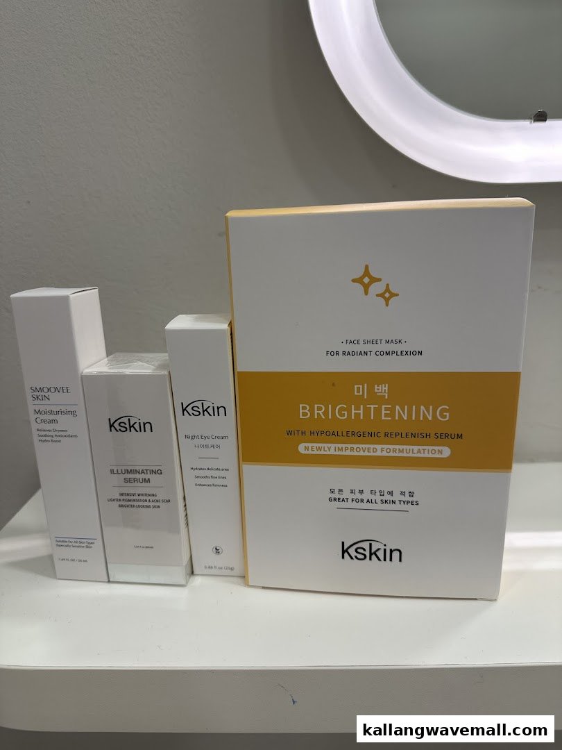 A display of Kskin skincare products, including moisturiser, serum, eye cream, and a brightening face mask.