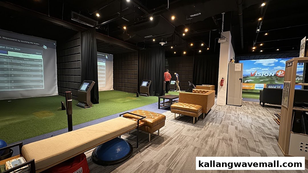 Indoor golf simulation bays with comfortable seating, offering a modern virtual golfing experience.