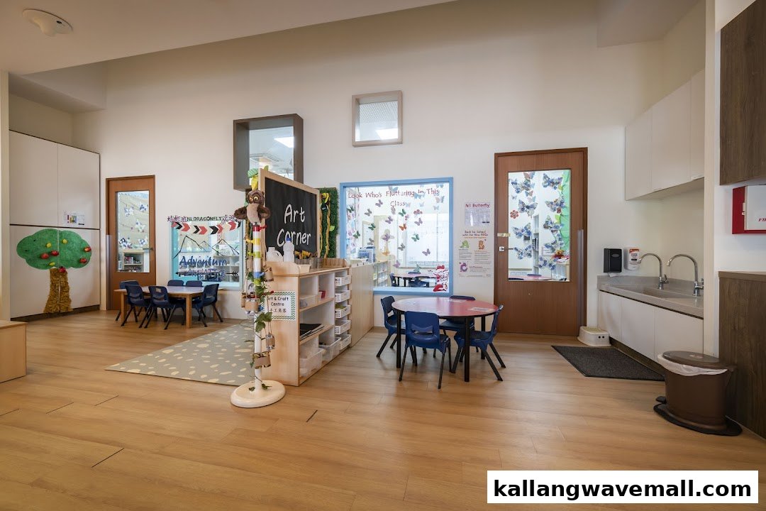 A bright, spacious preschool classroom with various learning and activity zones.