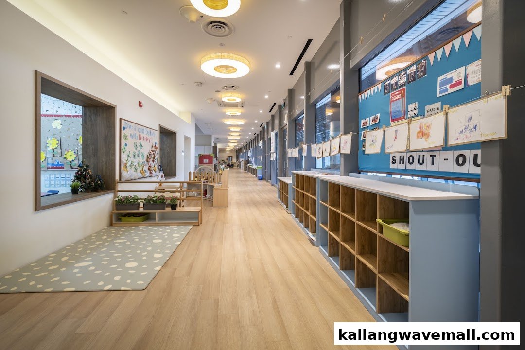 A bright, spacious hallway inside Lorna Whiston Preschool, featuring children's artwork and cubbies.