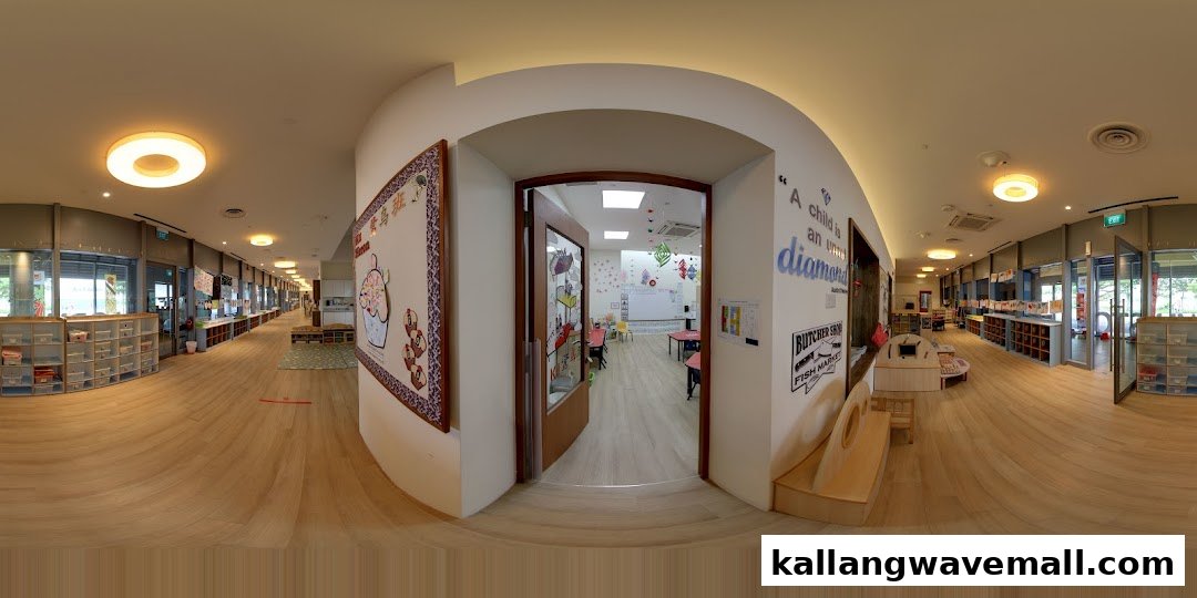 A bright, spacious hallway inside Lorna Whiston Preschool, featuring classrooms and child-friendly decor.