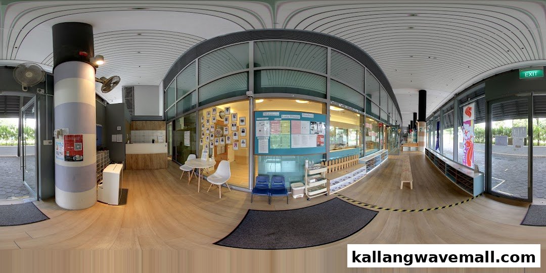 A panoramic view of the bright, modern interior entrance and reception area of Lorna Whiston Preschool.