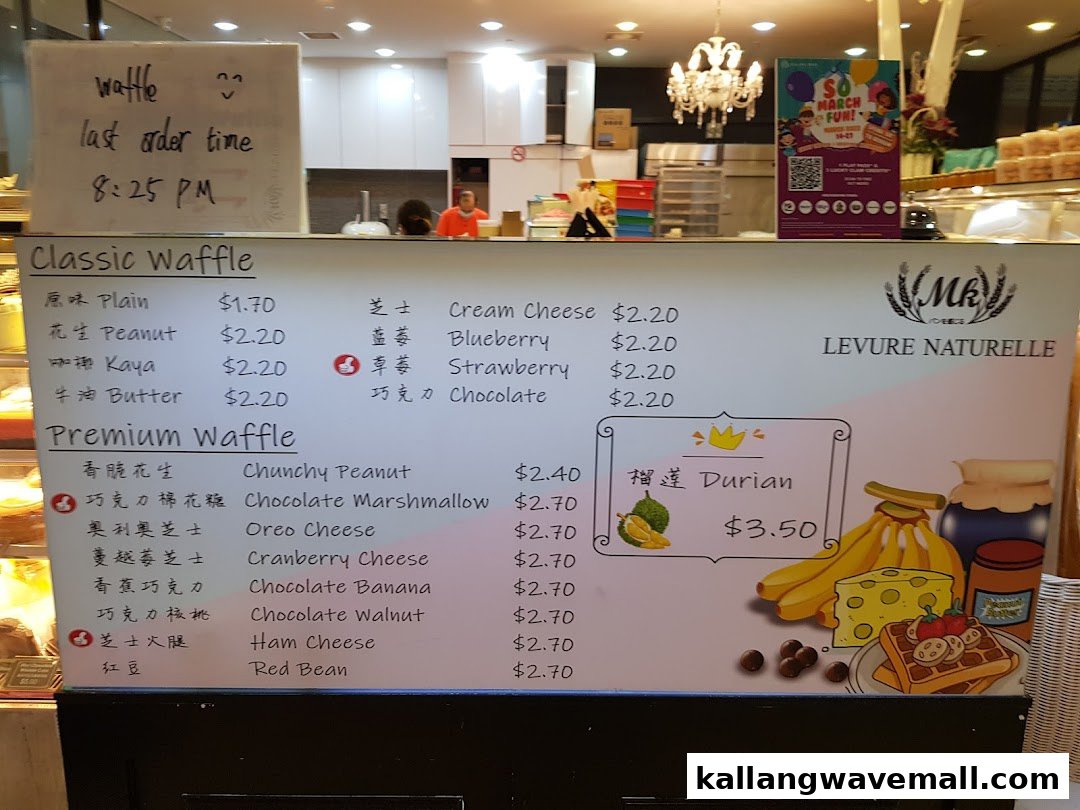 A detailed menu board for MK Levure Naturelle, showcasing classic and premium waffle options with prices.