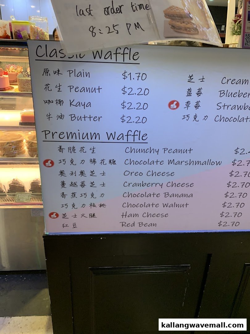 A detailed menu board displaying classic and premium waffle options with prices and last order time.