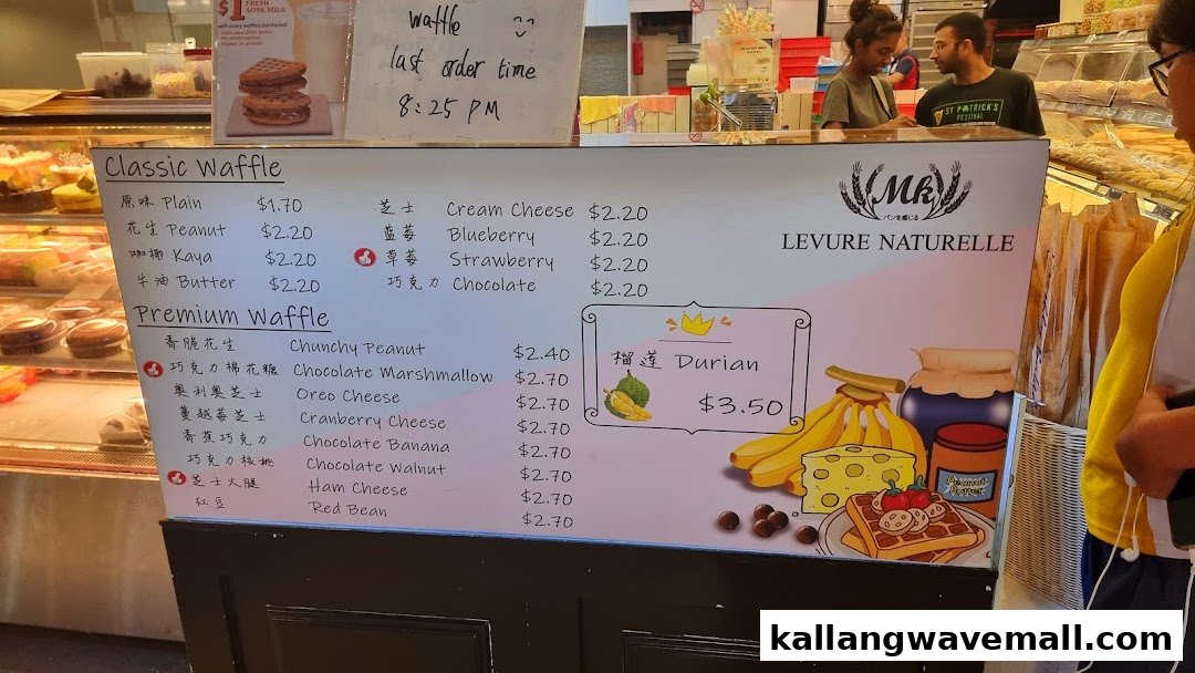 A detailed menu board for MK Levure Naturelle, showcasing classic and premium waffle options with prices.