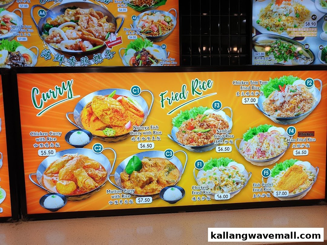 A vibrant menu display board showcasing various curry and fried rice dishes with prices.